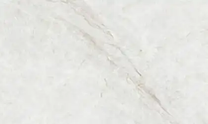 Closeup image of Q Quartz Ivoritaj Brushed White Quartz countertop slab