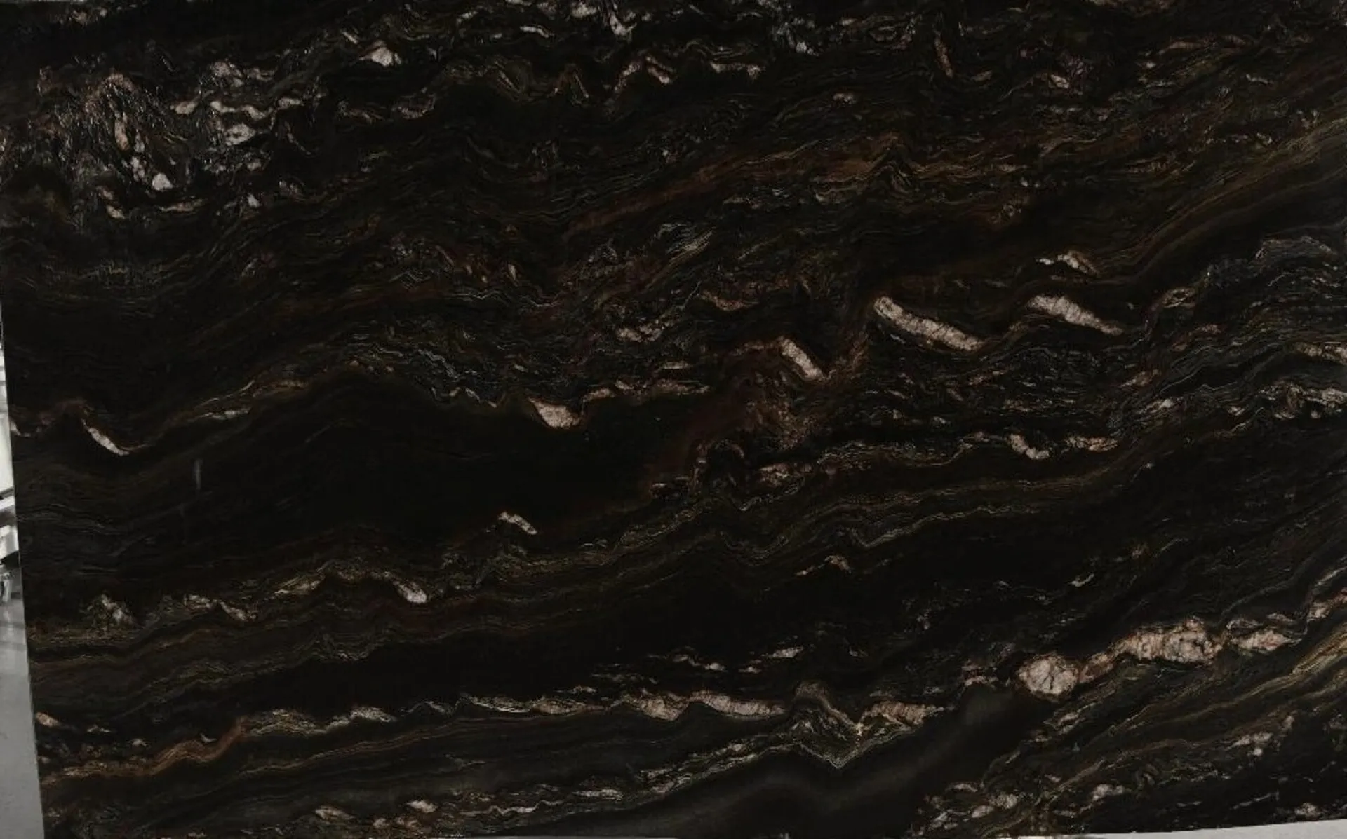 Closeup image of Mahogany Black Quartzite countertop slab