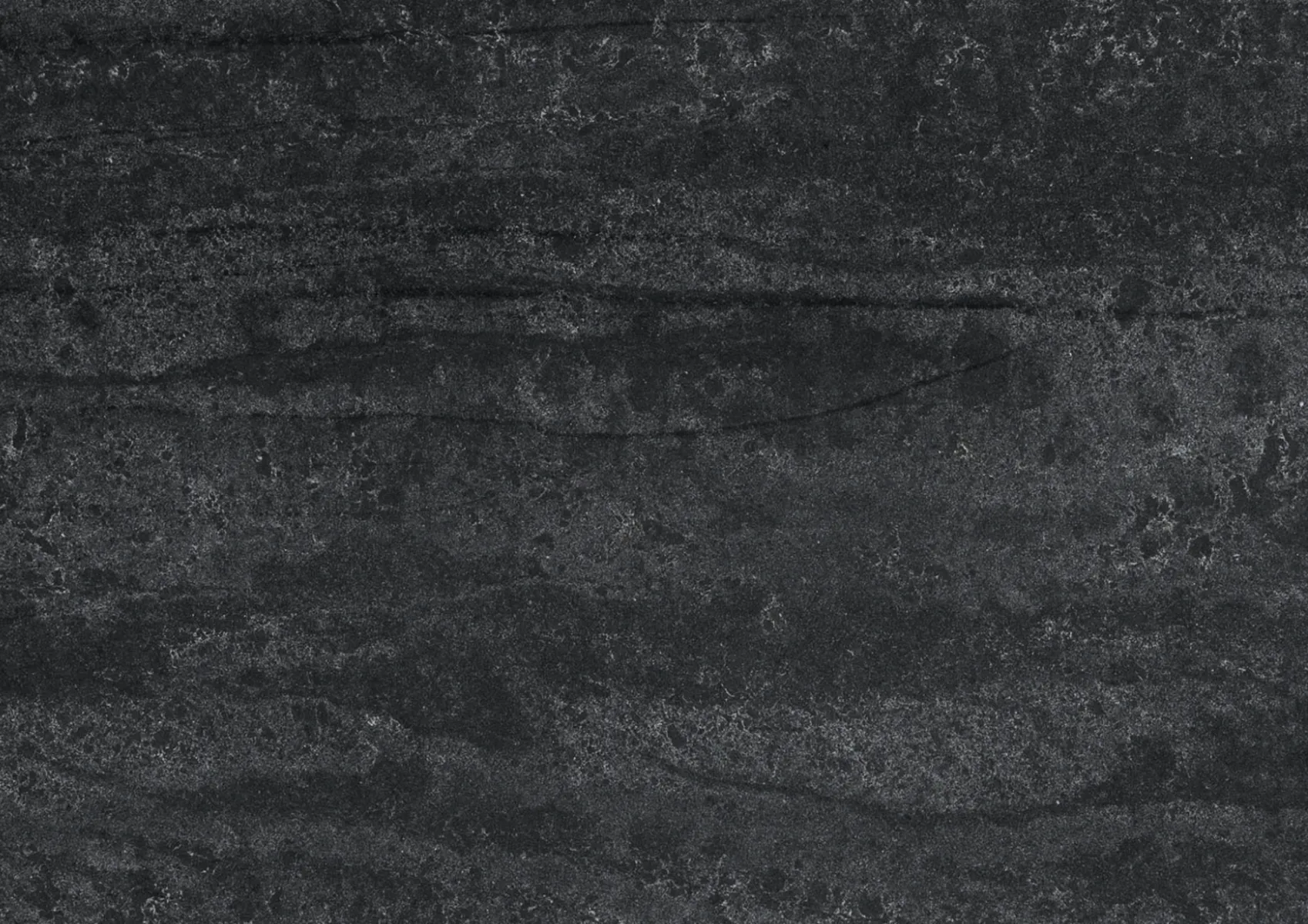Closeup image of Caesarstone Black Tempal Quartz countertop slab