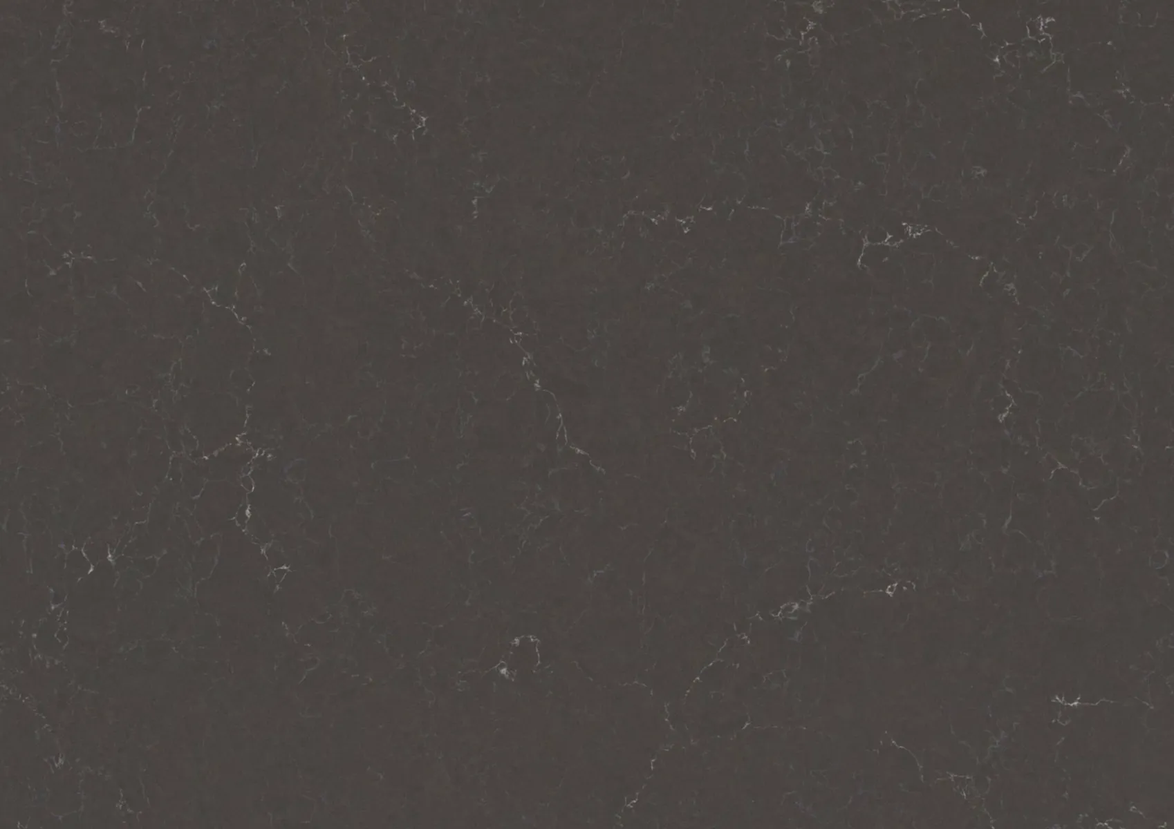 Closeup image of Caesarstone Piatra Grey Quartz countertop slab