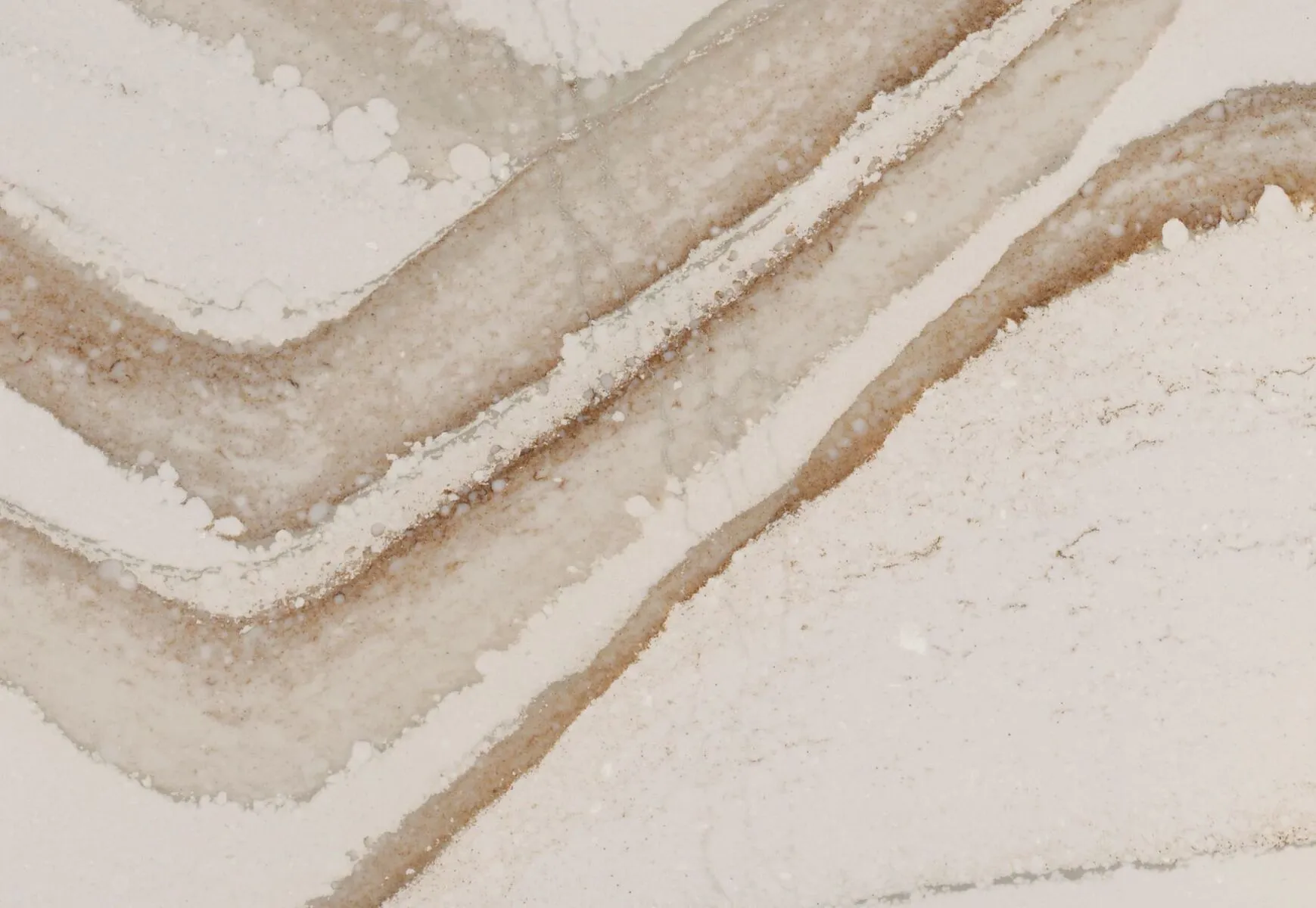 Closeup image of Cambria Brittanicca Gold Warm White Quartz countertop slab