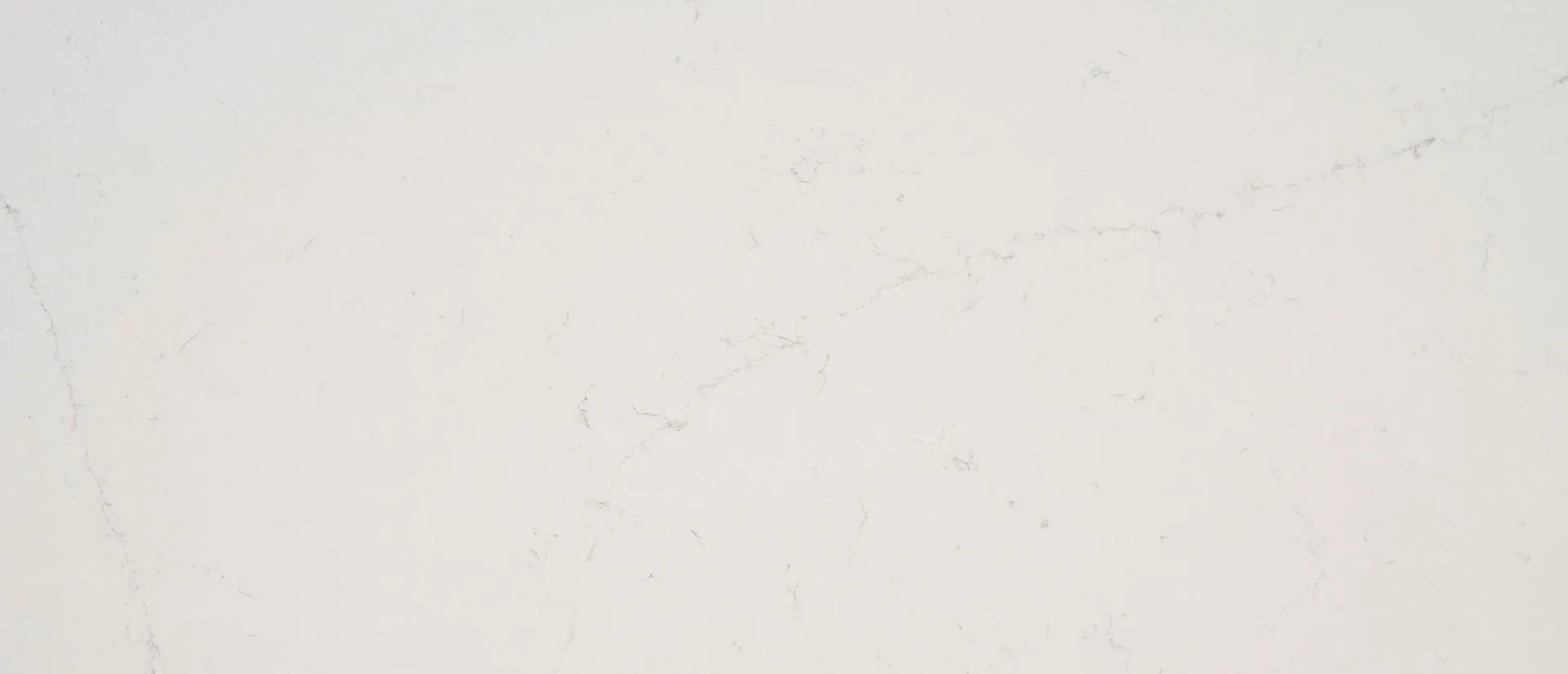 Closeup image of Q Quartz Alabaster White Quartz countertop slab