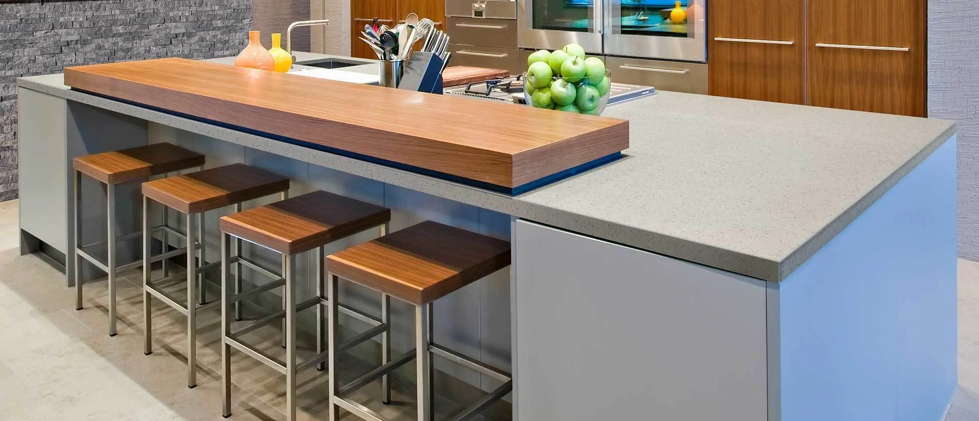 Image of installed Q Quartz Bianco Pepper Brown Quartz countertops