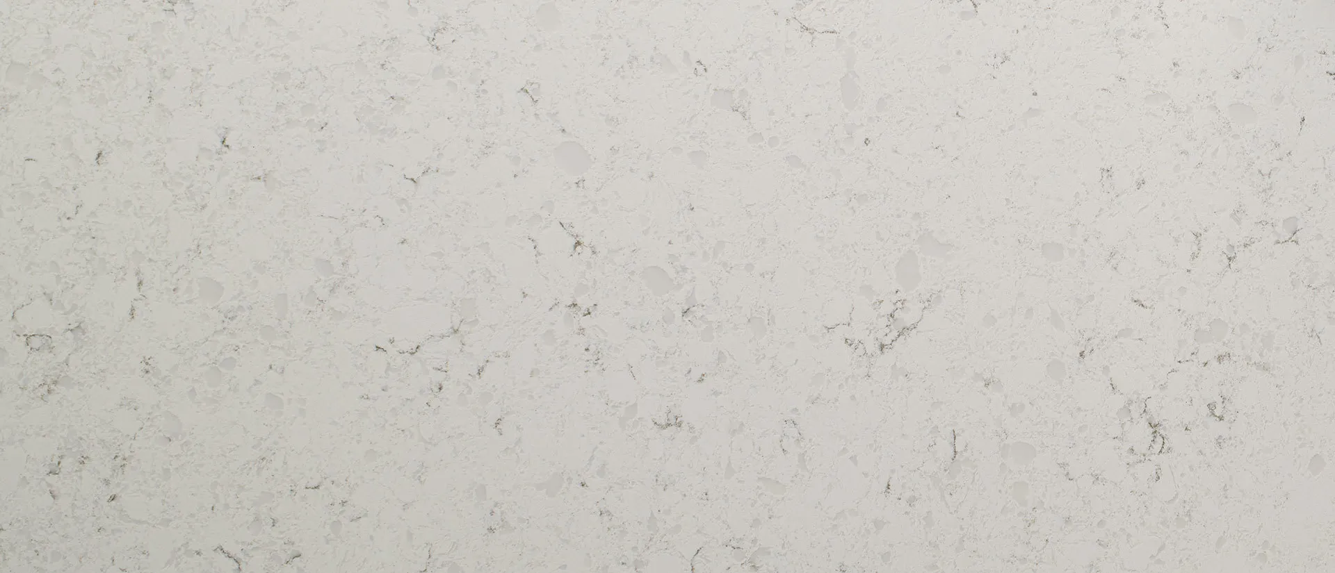 Closeup image of Q Quartz Blanca Statuarietto Quartz countertop slab