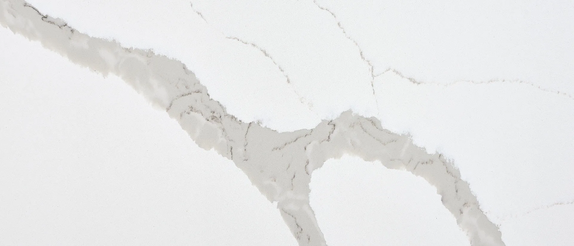 Closeup image of Q Quartz Calacatta Bali Quartz countertop slab