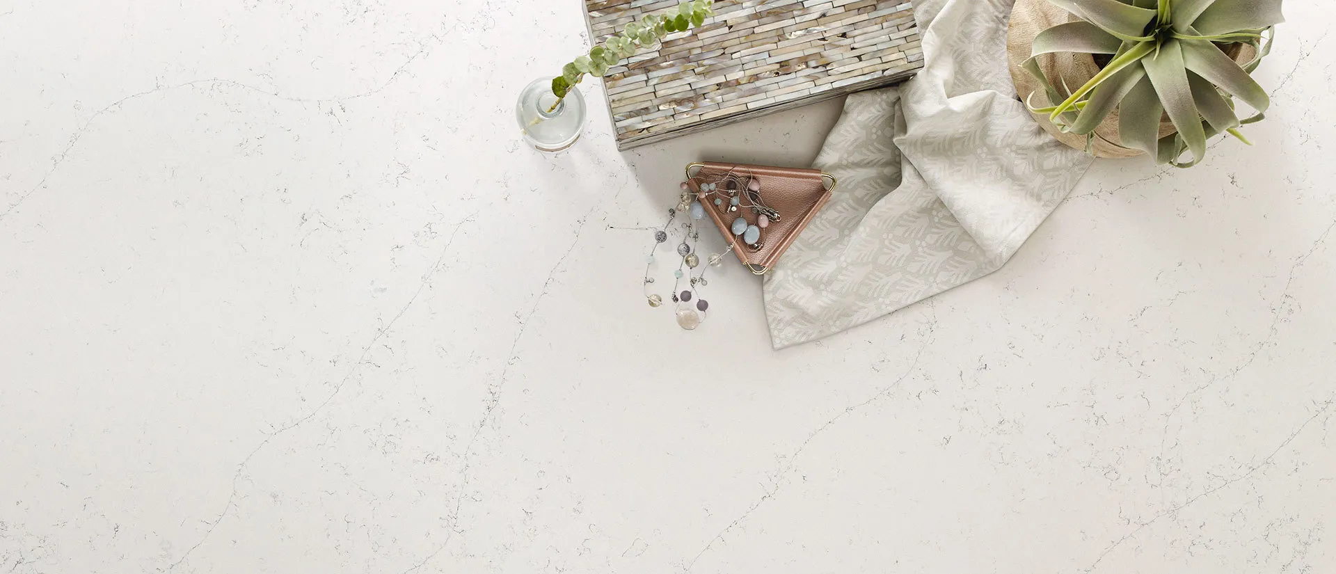 Image of installed Q Quartz Calacatta Botanica Quartz countertops