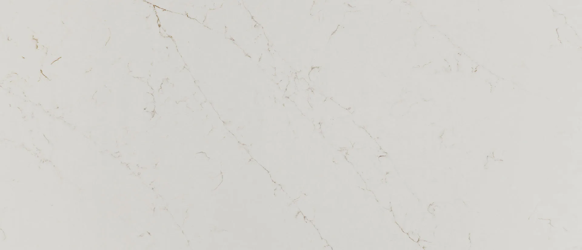 Closeup image of Q Quartz Calacatta Delios Quartz countertop slab