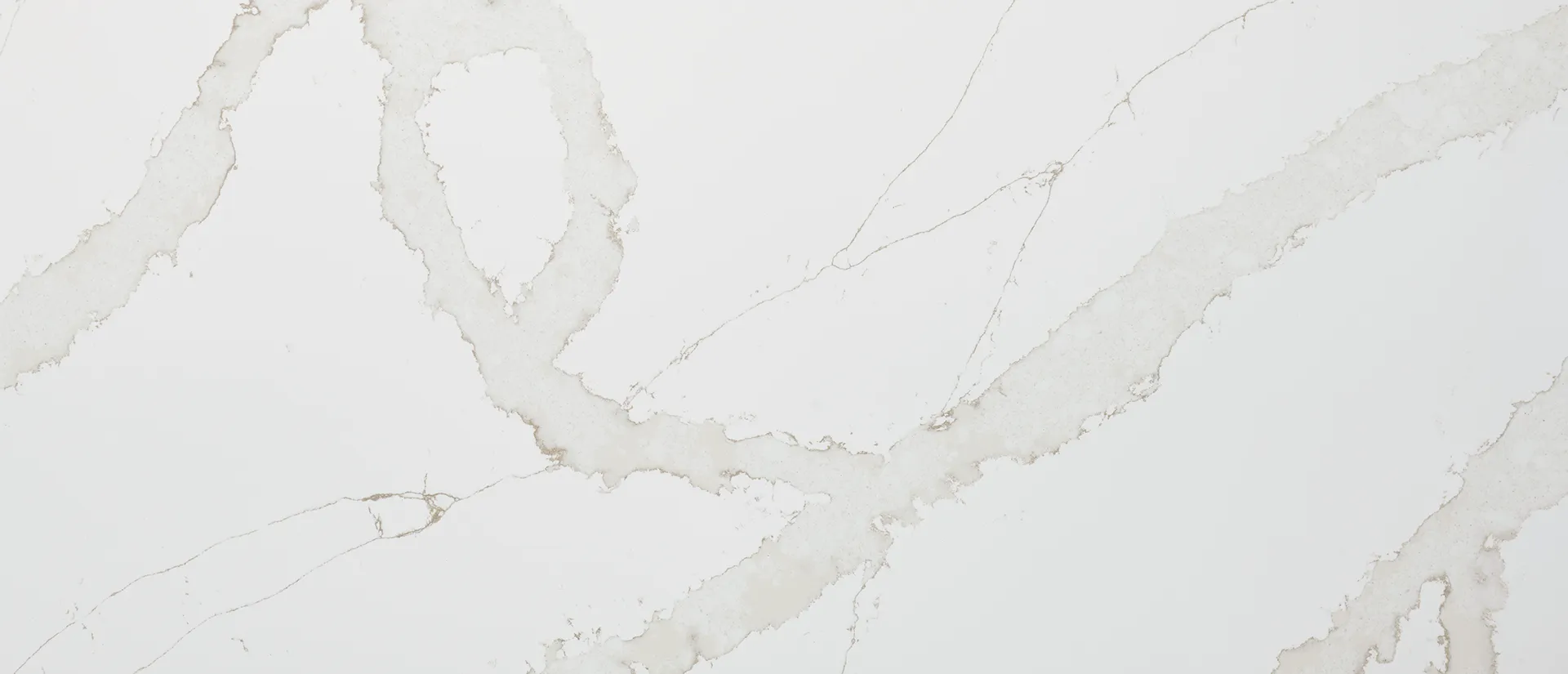 Closeup image of Q Quartz Calacatta Goa Quartz countertop slab
