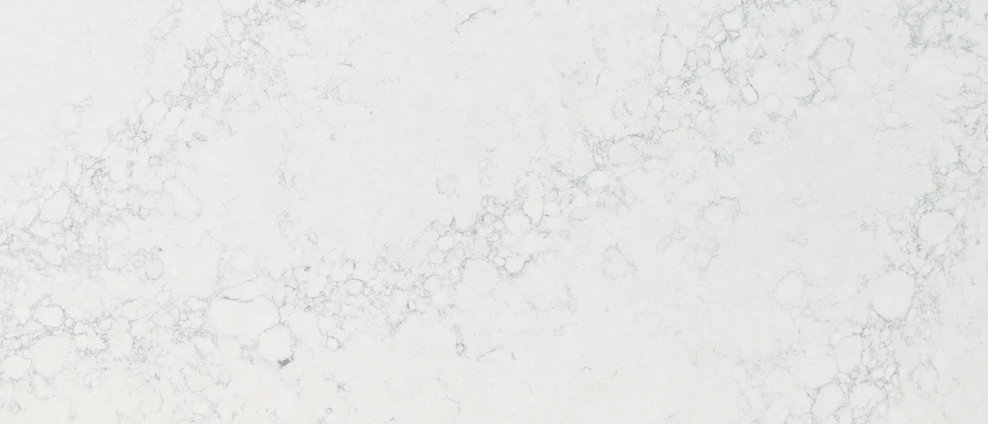 Closeup image of Q Quartz Calacatta Ida Quartz countertop slab