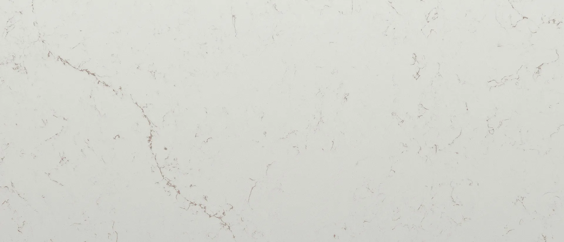 Closeup image of Q Quartz Calacatta Lavasa Quartz countertop slab