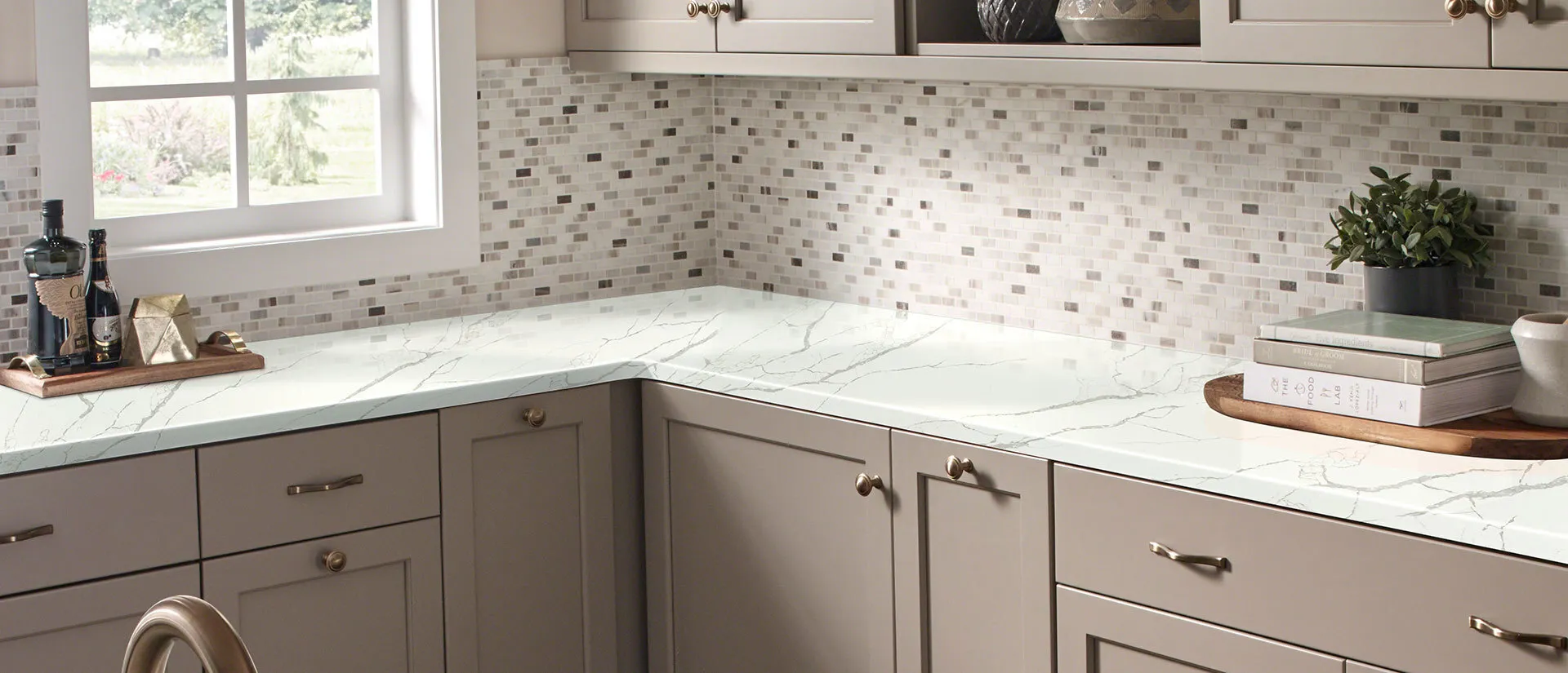 Image of installed Q Quartz Calacatta Laza Quartz countertops