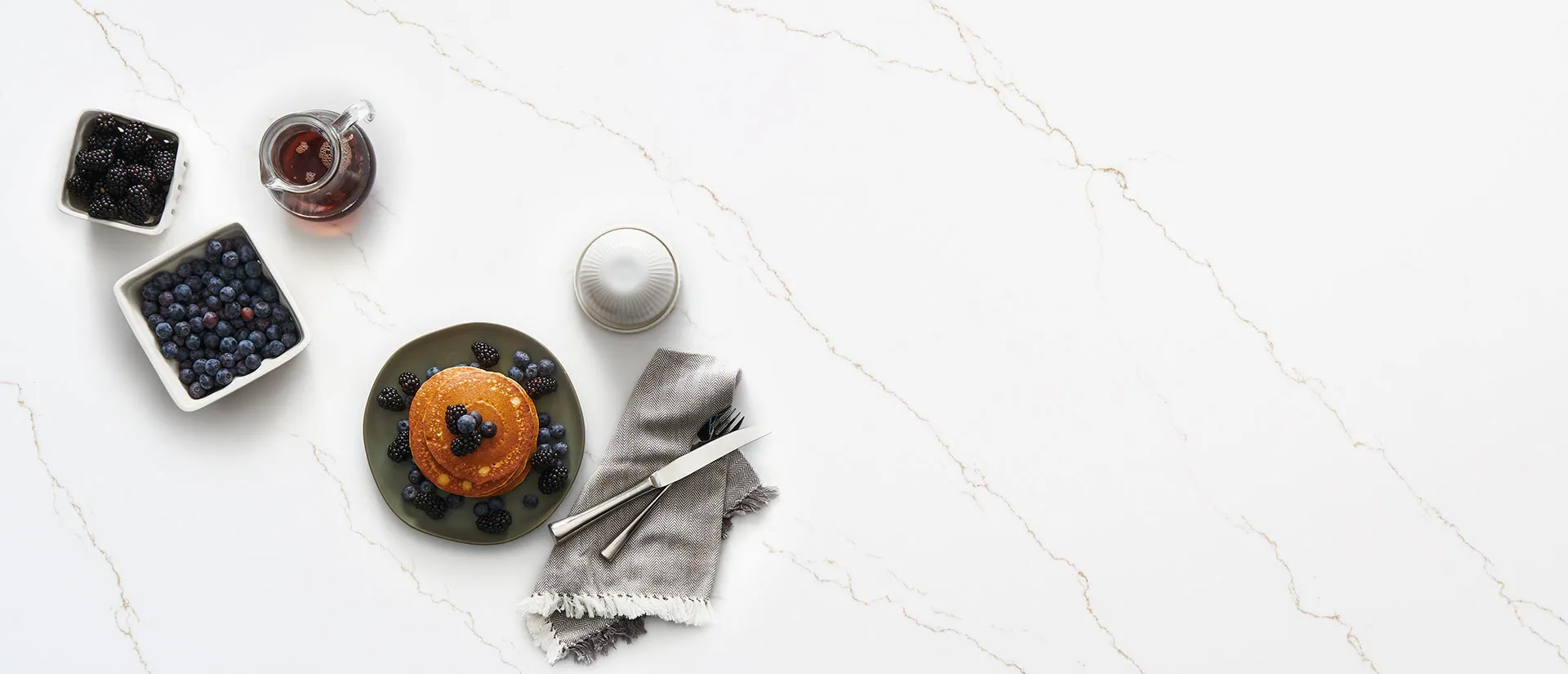 Image of installed Q Quartz Calacatta Miraggio Quartz countertops