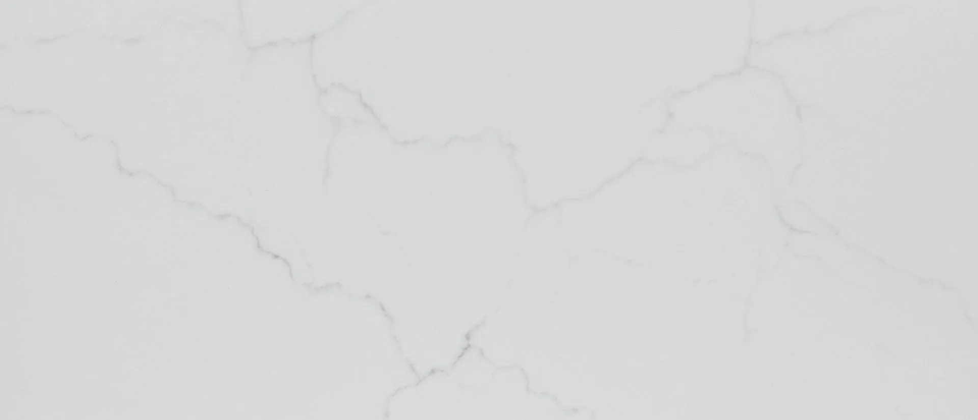 Closeup image of Q Quartz Calacatta Miraggio Quartz countertop slab