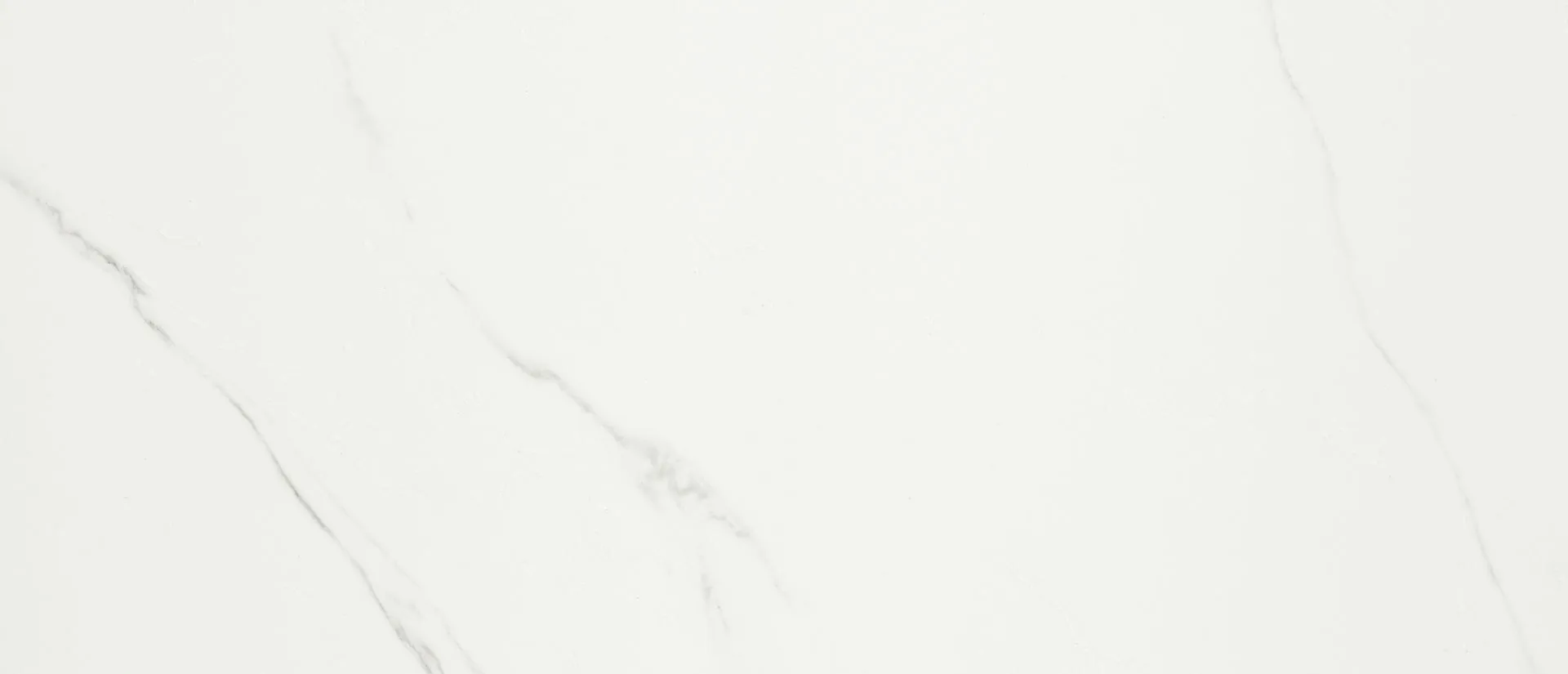 Closeup image of Q Quartz Calacatta Trevi Quartz countertop slab