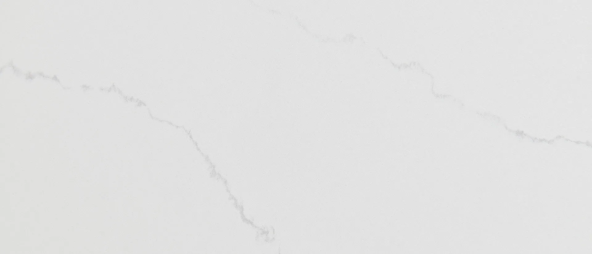 Closeup image of Q Quartz Calacatta Ultra Quartz countertop slab