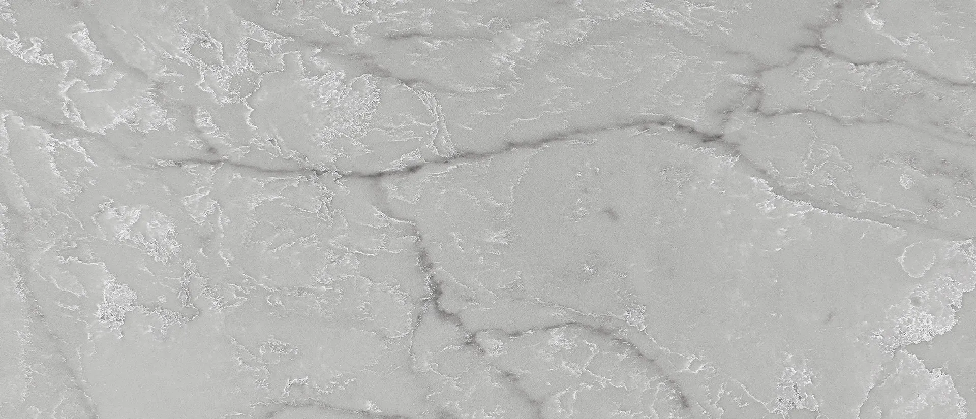 Closeup image of Q Quartz Calacatta Versailles Quartz countertop slab