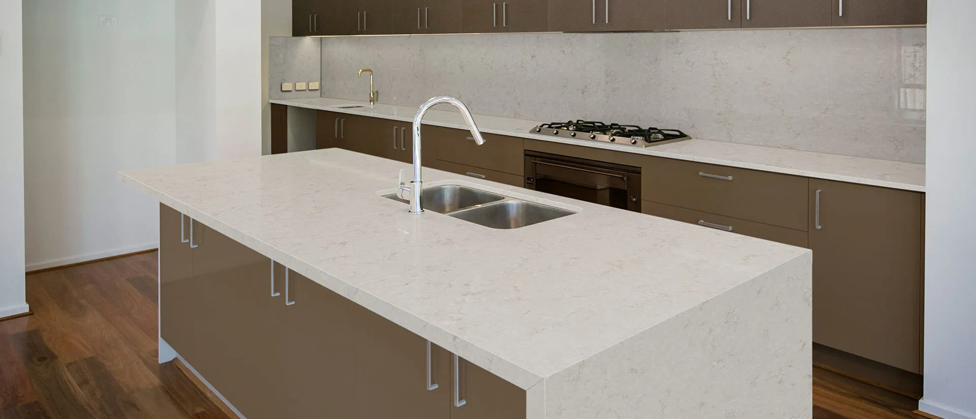 Image of installed Q Quartz Cashmere Taj Brown Quartz countertops