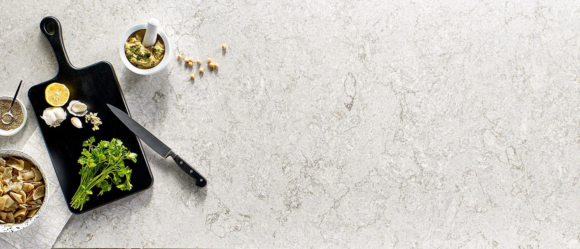 Image of installed Q Quartz Gray Lagoon Quartz countertops