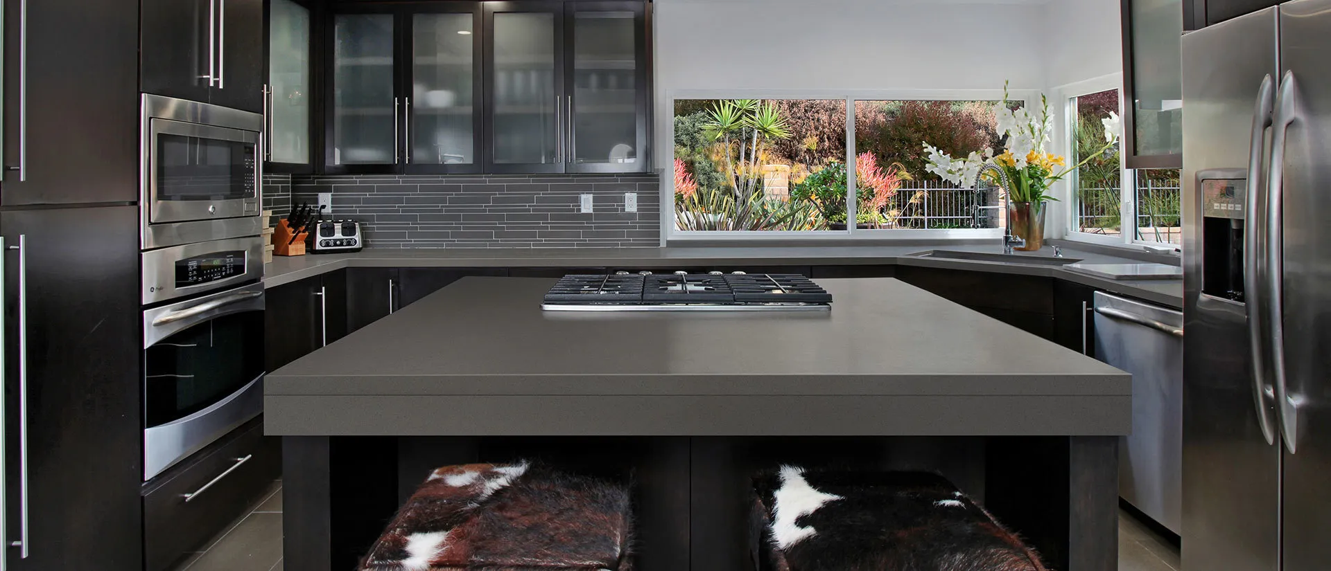 Image of installed Q Quartz Manhattan Gray Quartz countertops