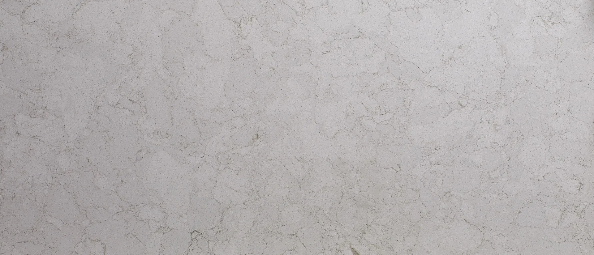 Closeup image of Q Quartz Marbella White White Quartz countertop slab