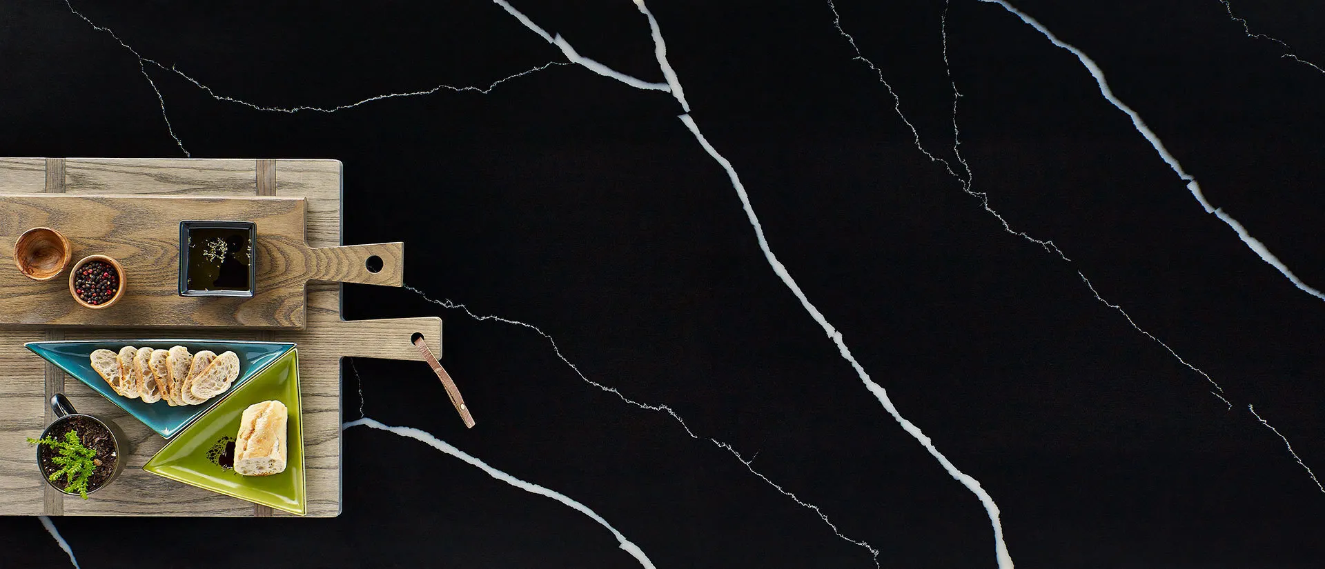 Image of installed Q Quartz Marquina Midnight Quartz countertops