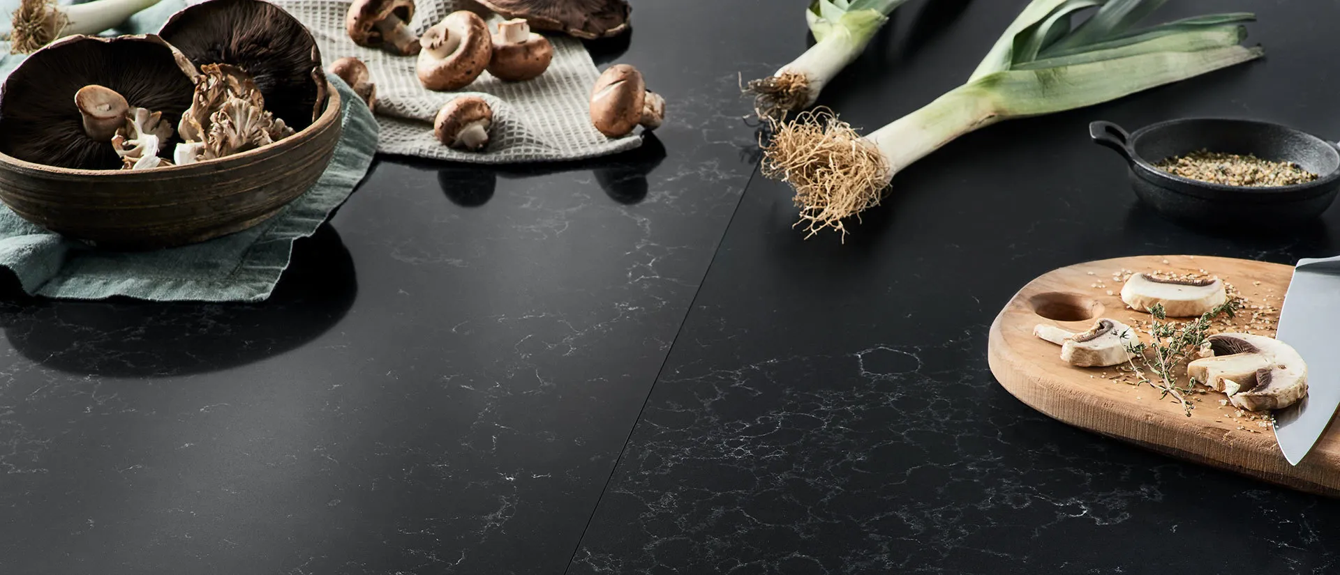 Image of installed Q Quartz Midnight Corvo Quartz countertops