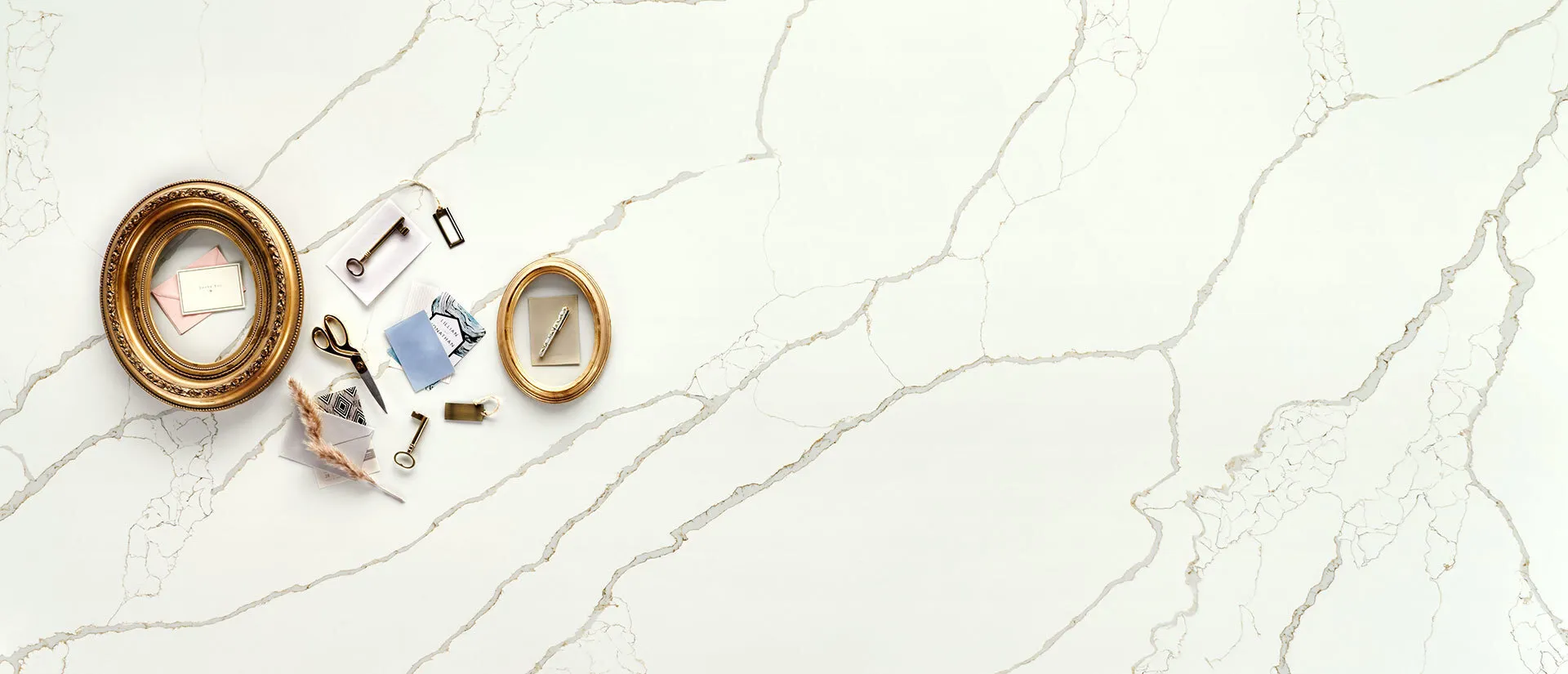 Image of installed Q Quartz New Calacatta Laza Gold Quartz countertops