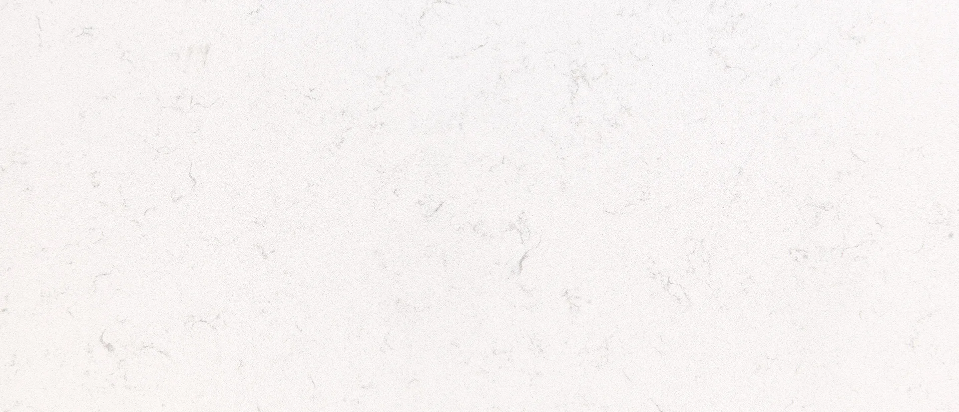 Closeup image of Q Quartz New Carrara Marmi Quartz countertop slab