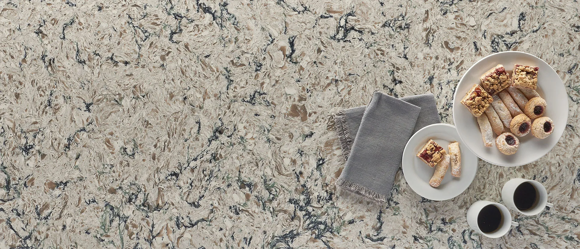 Image of installed Q Quartz Pacific Salt Cream Quartz countertops