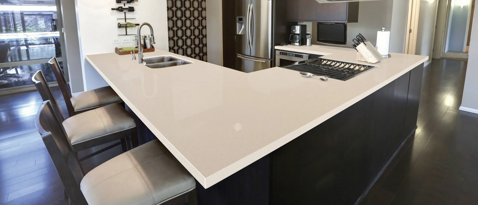 Image of installed Q Quartz Pebble Rock Brown Quartz countertops