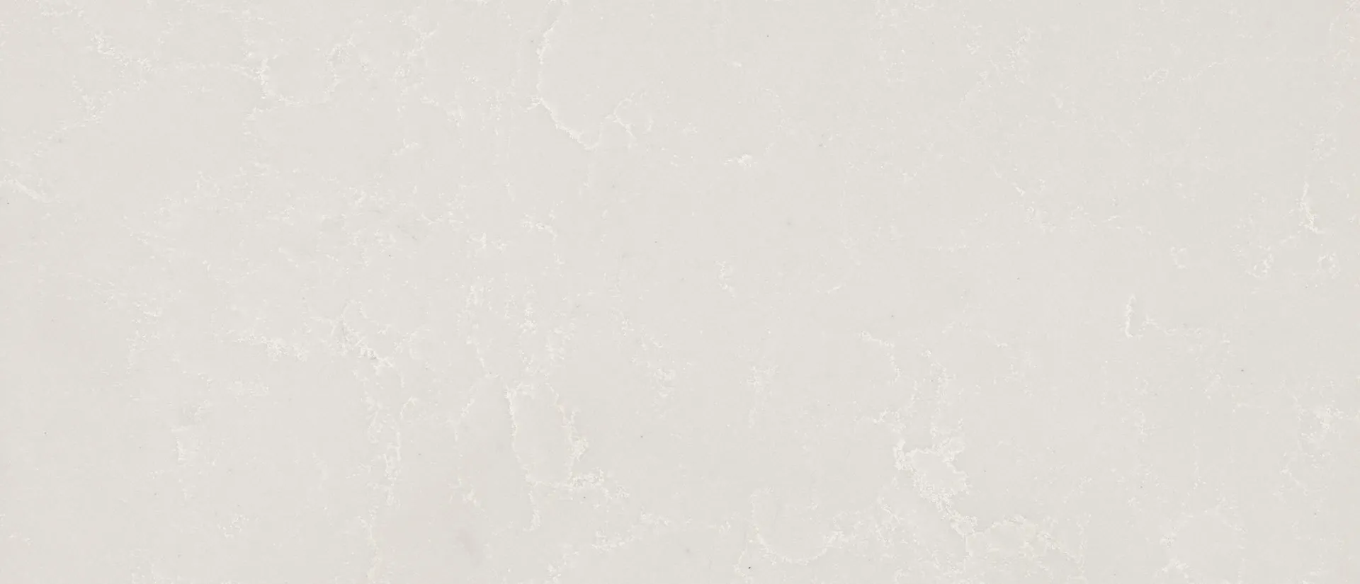 Closeup image of Q Quartz Perla White White Quartz countertop slab