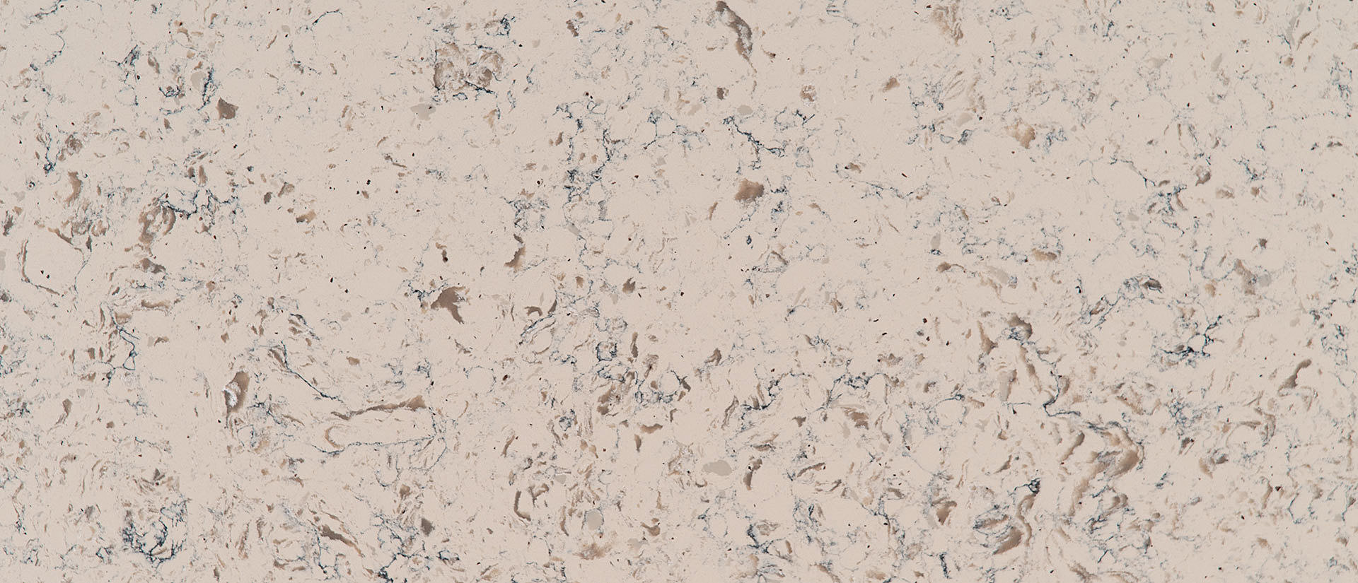 Closeup image of Q Quartz Romano White Brown Quartz countertop slab