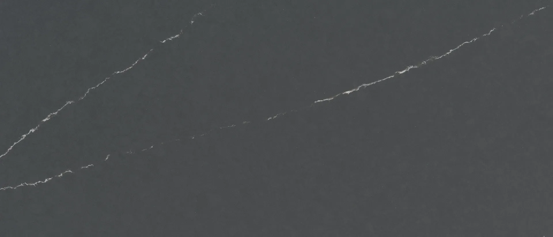 Closeup image of Q Quartz Soapstone Metropolis Grey Quartz countertop slab