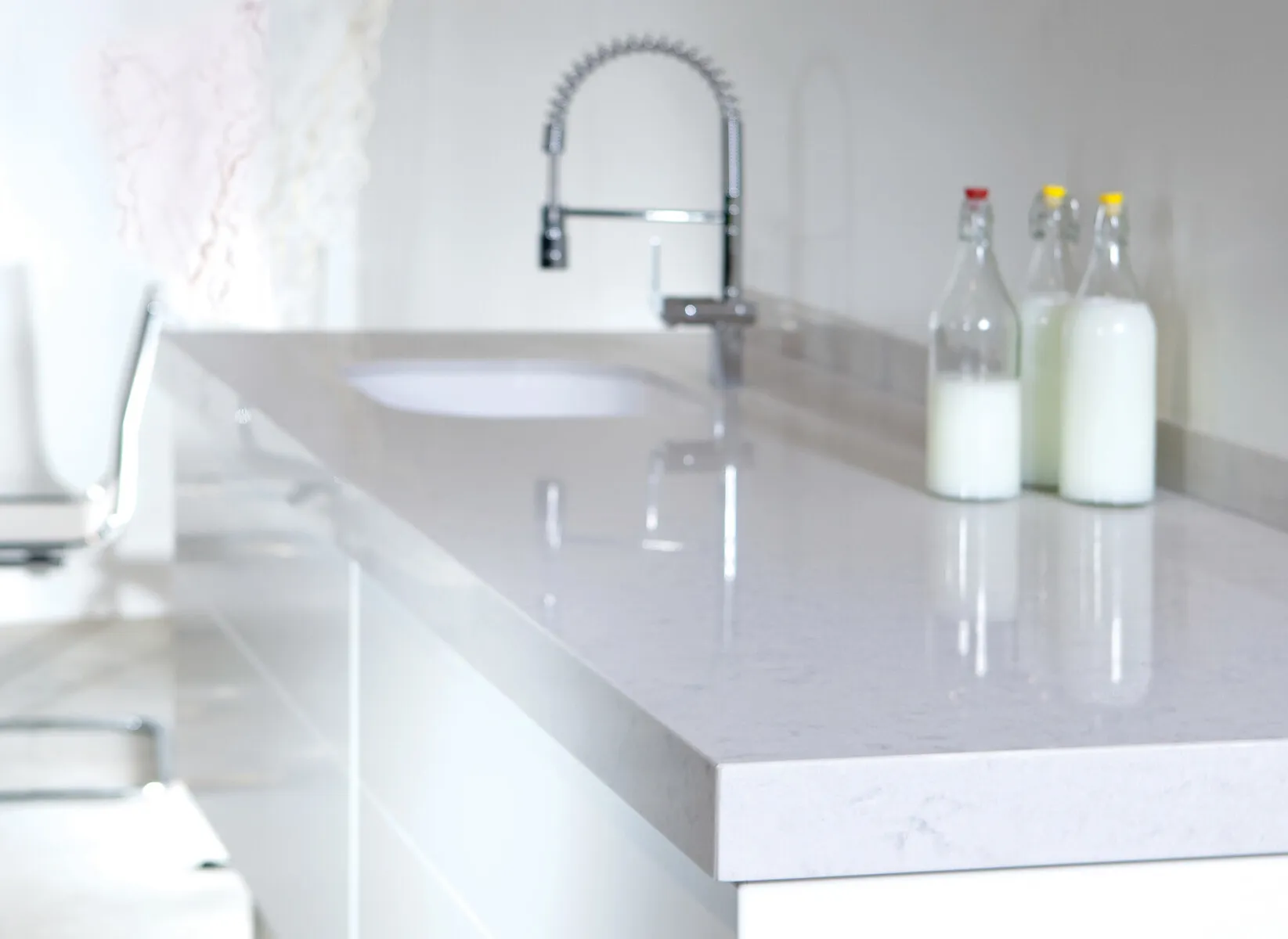 Image of installed Silestone Lagoon White Quartz countertops
