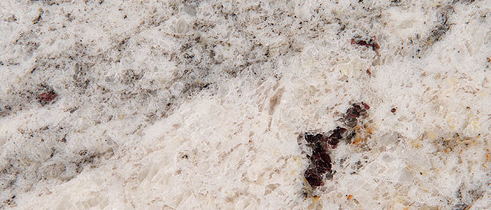 Closeup image of African Rainbow Brown Granite countertop slab
