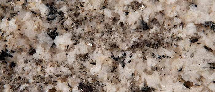 Closeup image of Arctic Sand Grey Granite countertop slab