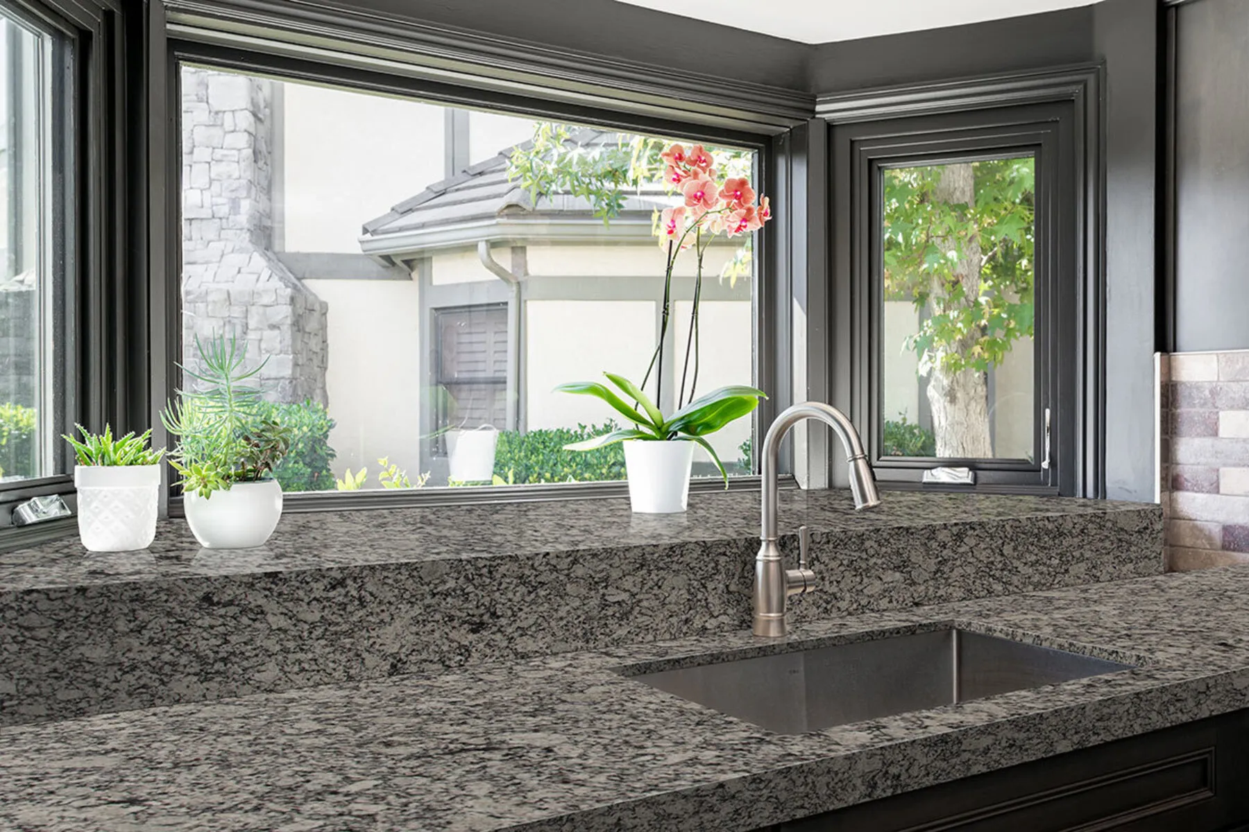Image of installed Bianco Frost Granite countertops