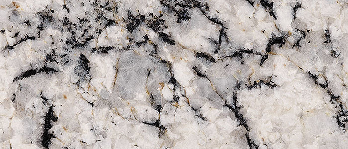 Closeup image of Blizzard Grey Granite countertop slab