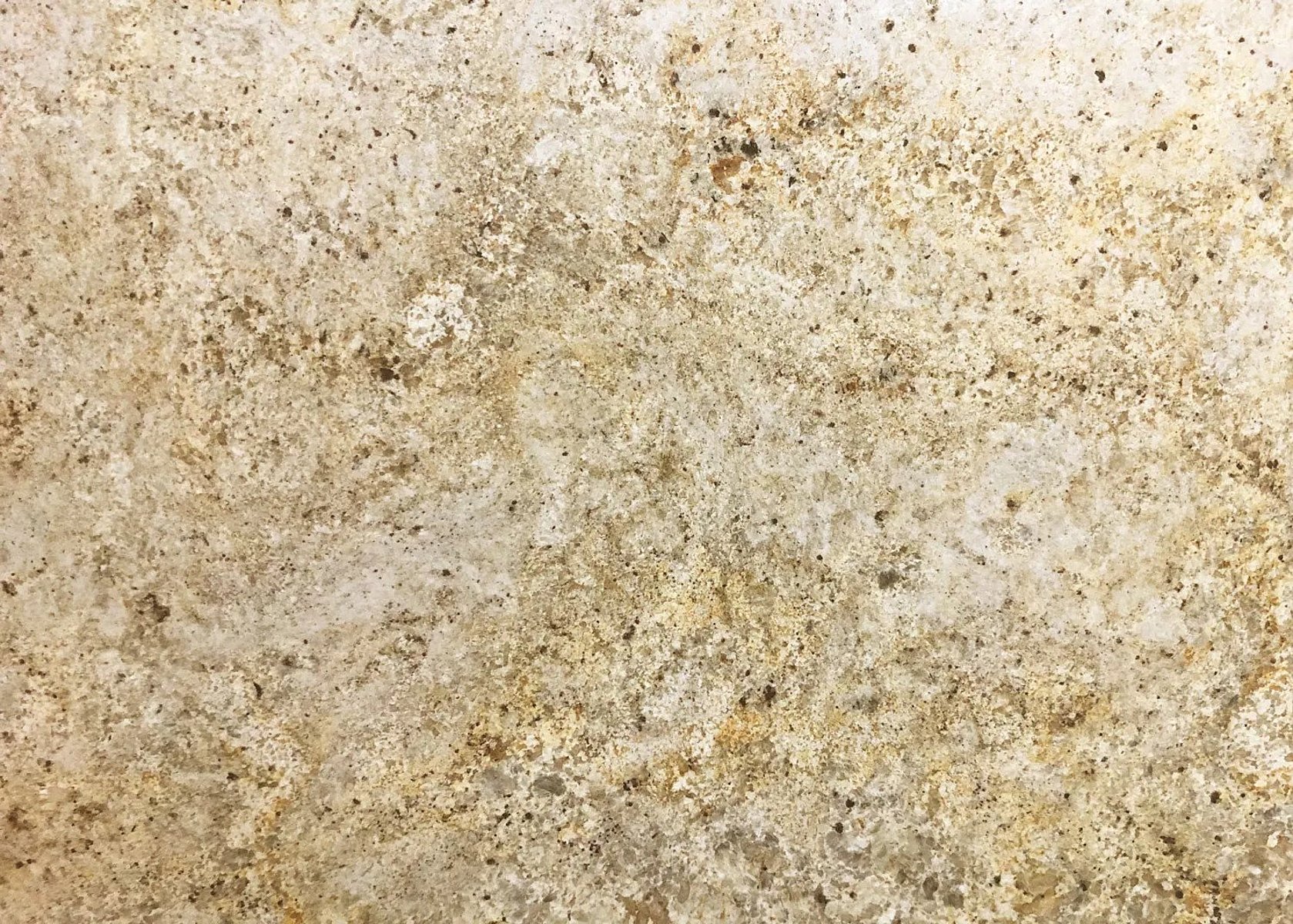 Closeup image of Colonial Cream Granite countertop slab