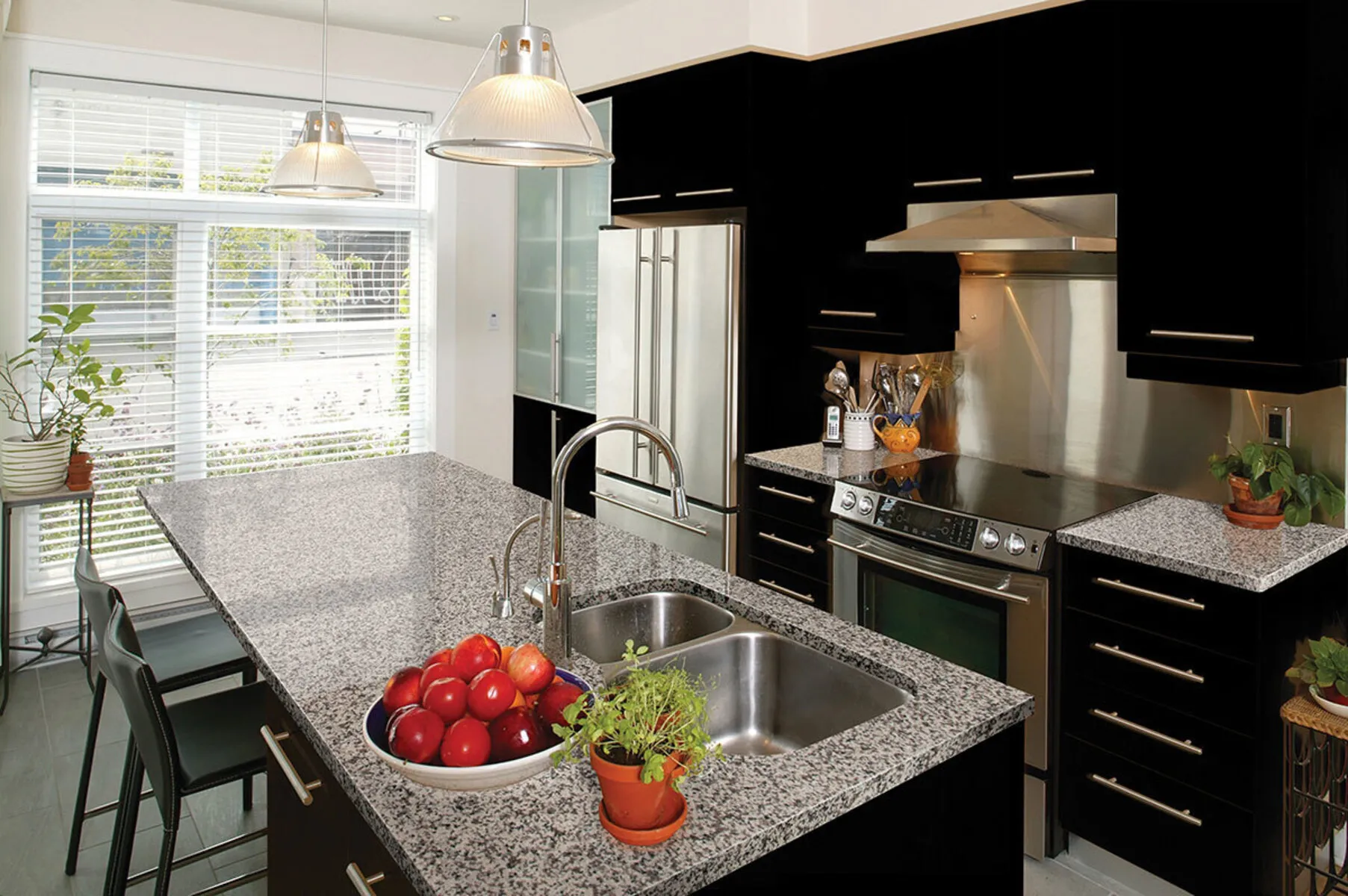Image of installed Crema Atlantico Grey Granite countertops