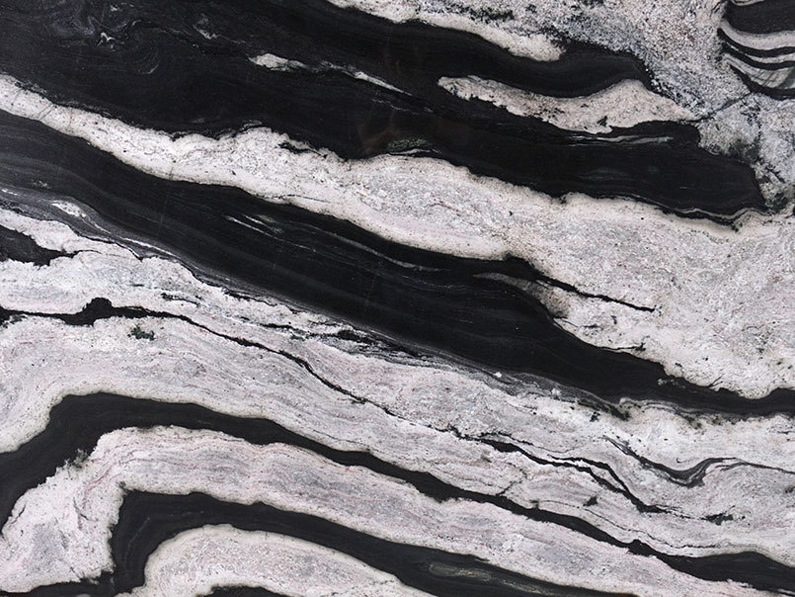 Closeup image of Eclipse White Granite countertop slab