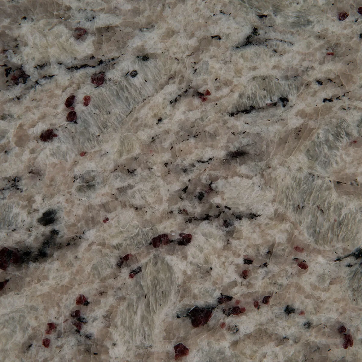 Closeup image of Giallo Fiesta Grey Granite countertop slab