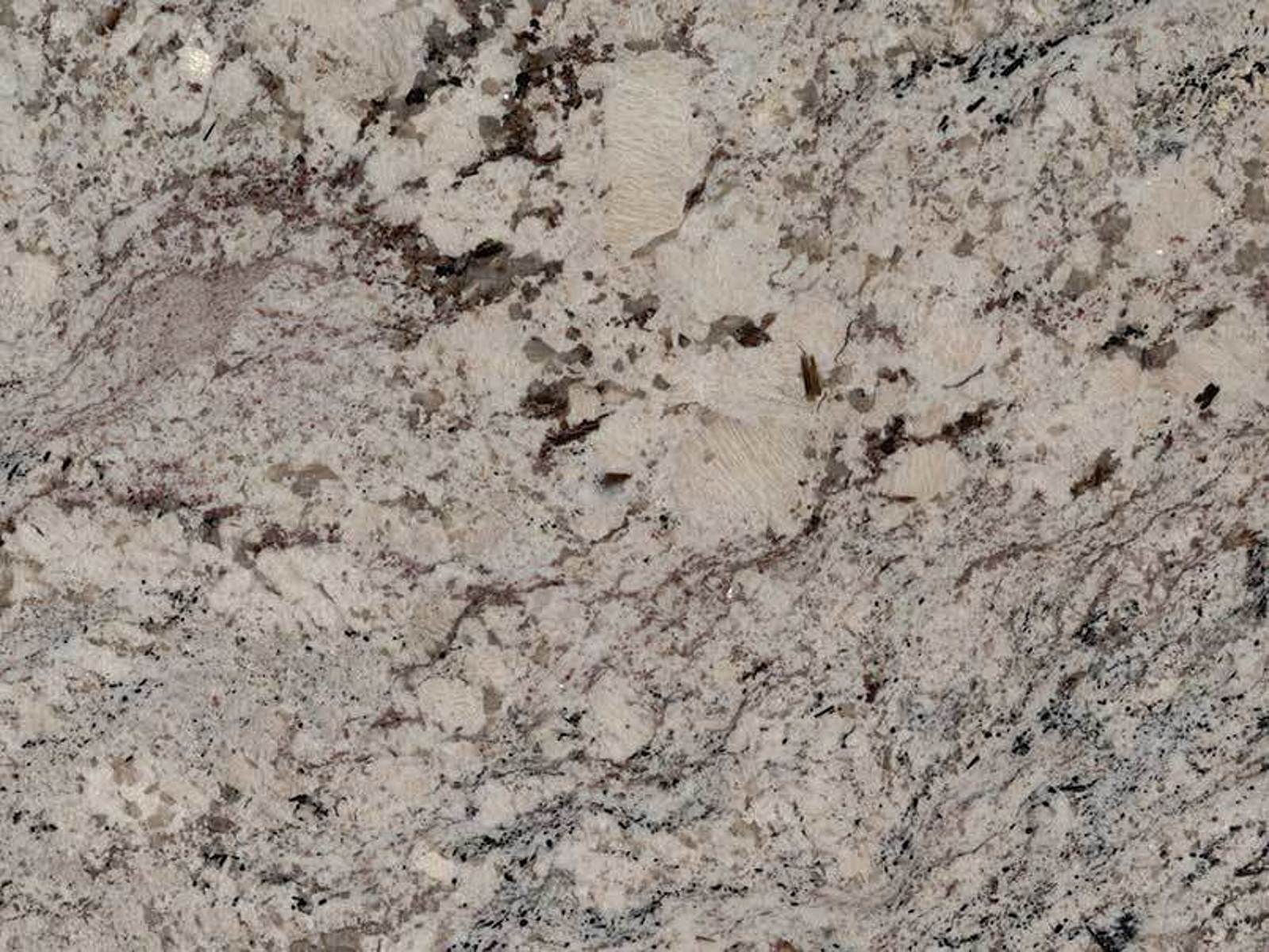 Closeup image of Nevasca Mist Granite countertop slab