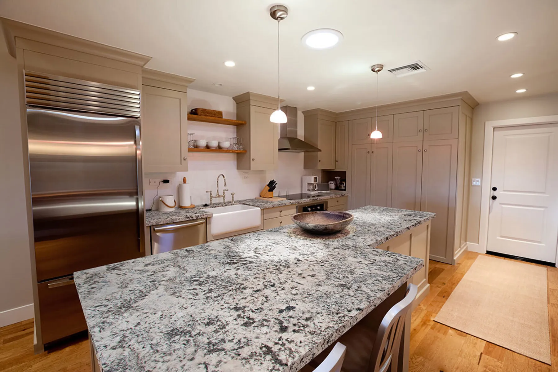 Image of installed Oyster White Grey Granite countertops