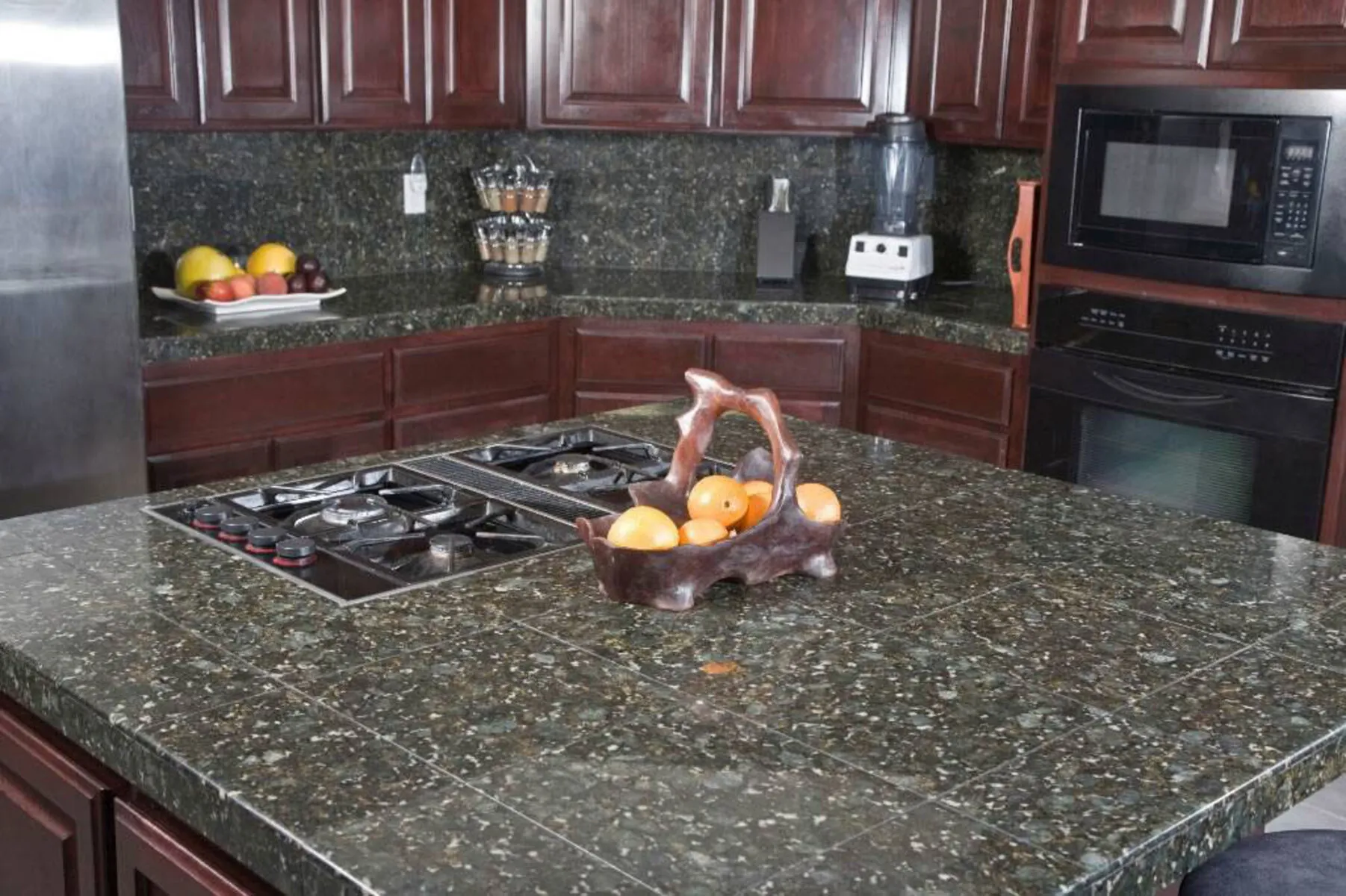 Image of installed Peacock Green Granite countertops