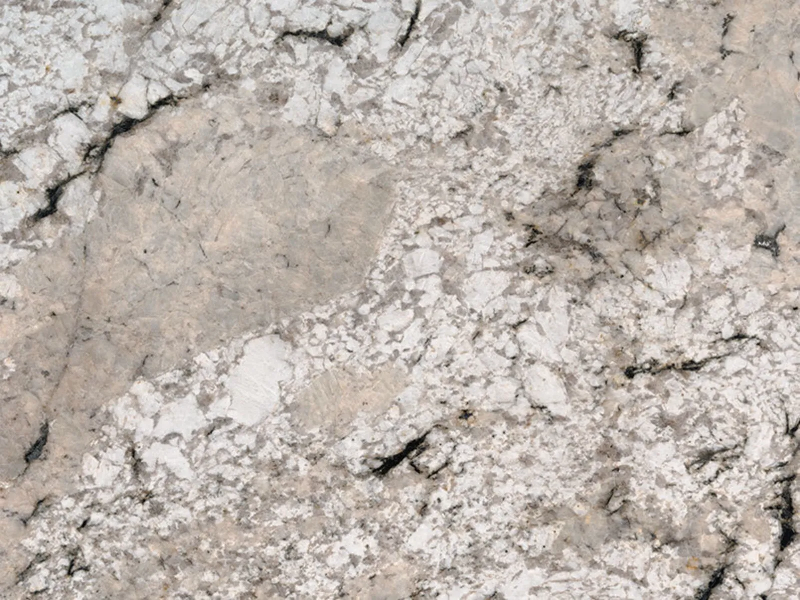 Closeup image of Sunset Canyon Grey Granite countertop slab