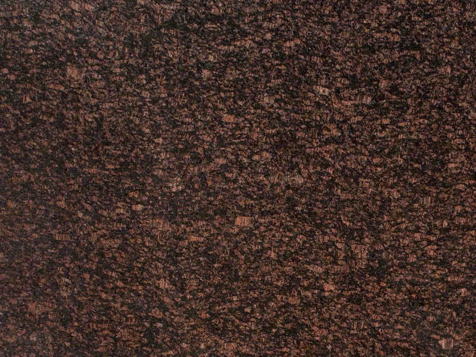 Closeup image of Tan Brown Granite countertop slab