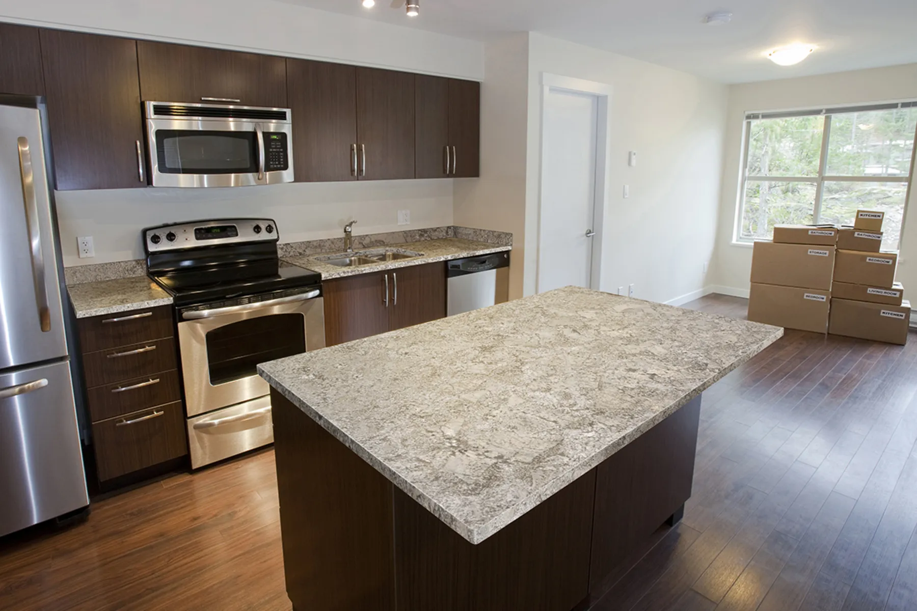 Image of installed White Sand Cream Granite countertops