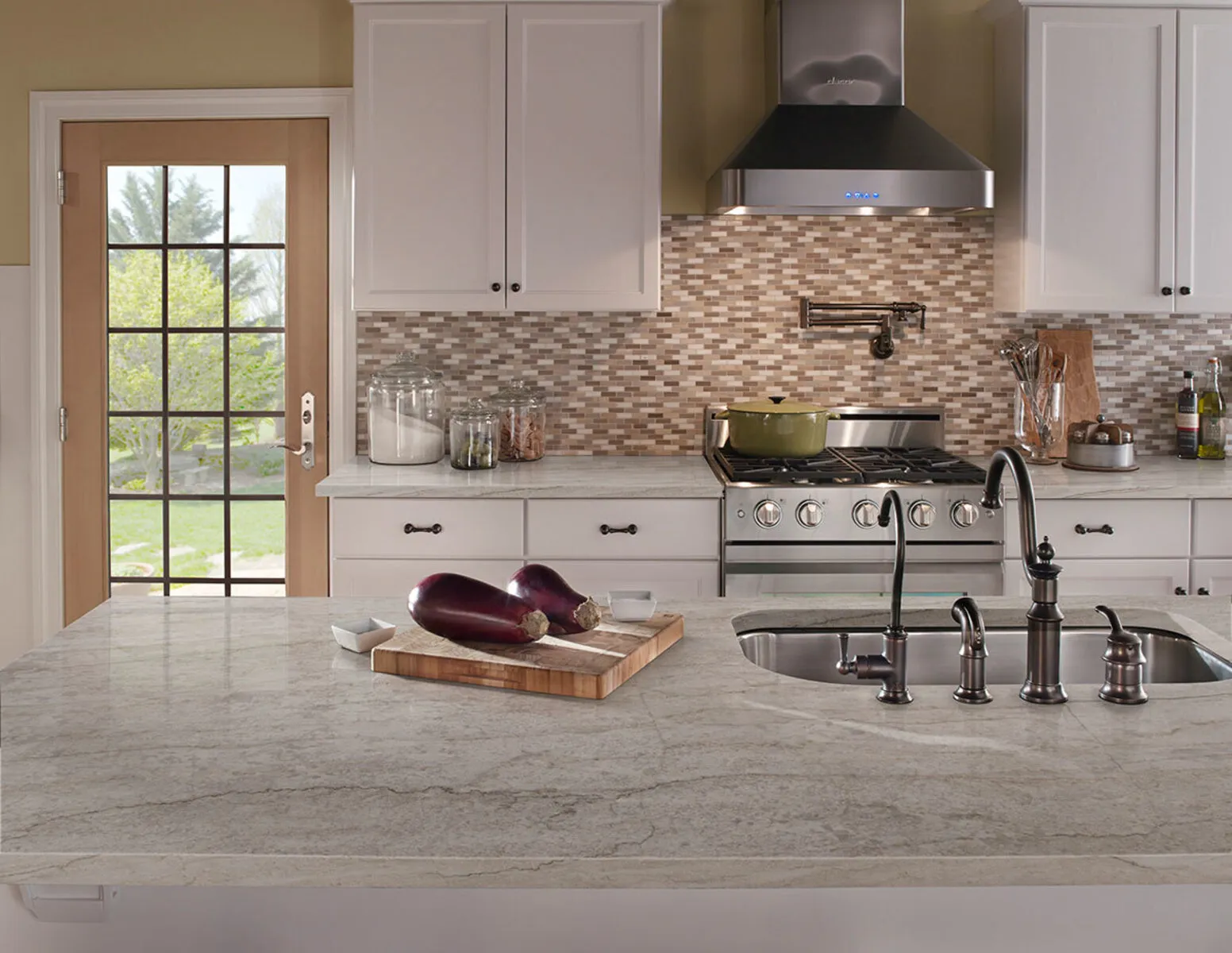 Image of installed Sea Pearl Quartzite countertops