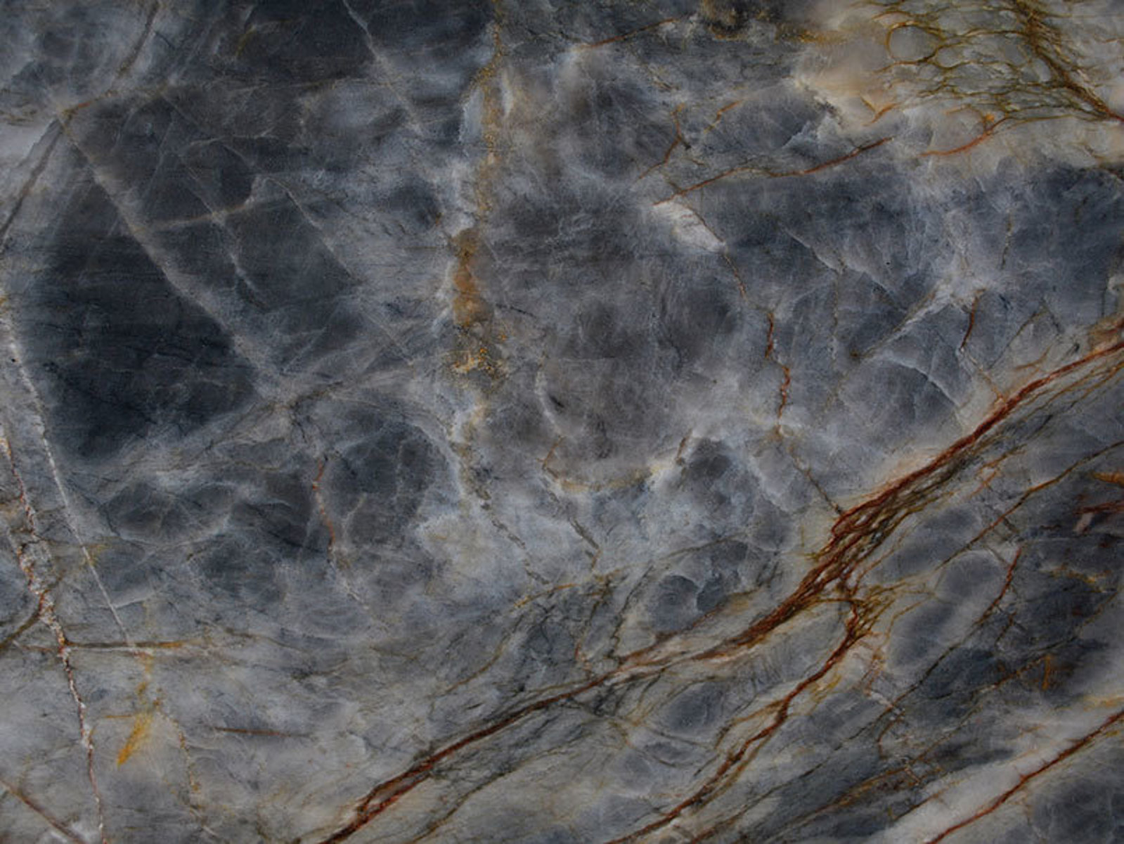 Closeup image of Tempest Grey Quartzite countertop slab